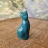 Pequena escultura de gato em cerâmica Verde turquesa escuro