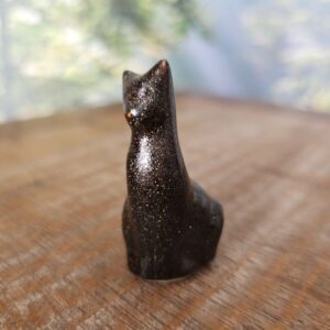 Pequena escultura de gato em cerâmica preto glitter